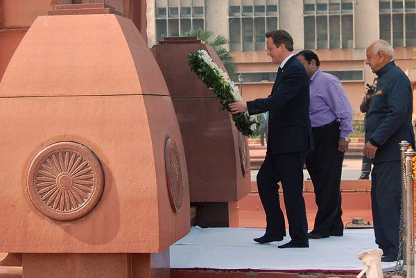 PAYING RESPECTS: Cameron lays a wreath in tribute to the Jallianwala Bagh martyrs at the Jallian wala Bagh memorial in Amritsar. — AFP photo