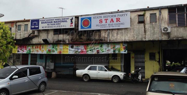 TOO CLOSE FOR COMFORT: STAR service centre next to Nansian’s service centre. 