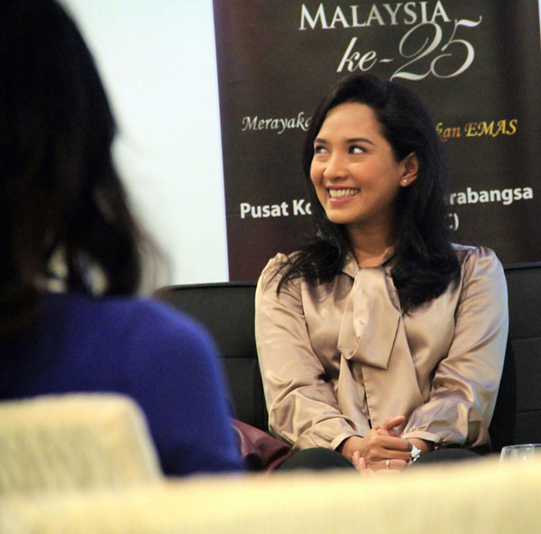 LIGHT MOMENT: Vanidah Imran, who was in Kuching for the FFM promotion, reacts to a joke during the press conference.