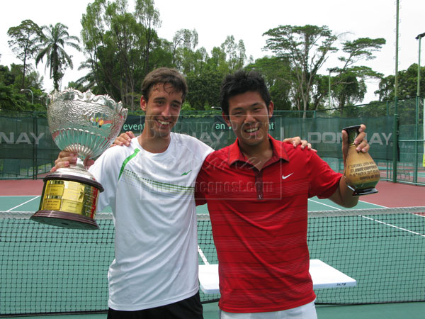 TOP JUNIOR: File photo shows Nikola Milojevic (left) holding the championship trophy after defeating Kim Jae Hwan of South Korea 6-1, 6-4 in Chief Minister’s Cup boys singles final at SLTA’s centre court on March 18 last year.