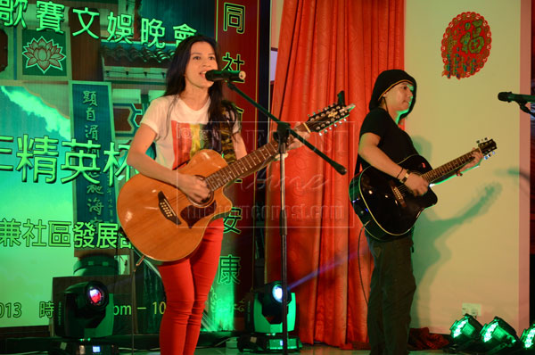 GREAT PERFORMANCE: Number and guitarist Sim Kok Hao, who is also vocalist of local band Dream Machine, performing on stage. 