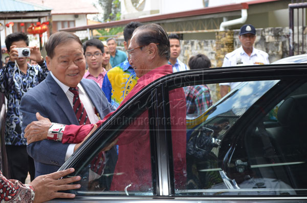 HOW ARE YOU?: Salahuddin (right) being greeted by Lau at his residence.   