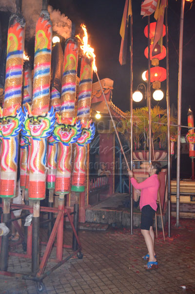 NIGHT TO REMEMBER: The colours and sounds at the temple draw thousands of tourists. 