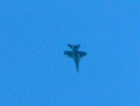 AIR POWER: A jet fighter seen at Lahad Datu skies around 7am on Tuesday. 