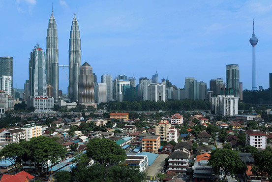 PLANNED DIVESTMENTS: Photo shows the skyline of Kuala Lumpur. A divestment strategy to pare down GLIC’s holdings involves 33 GLCs held by six GLICs: lowering stakes in five GLCs, listing of seven GLCs and the outright sale of 21 GLCs. — Bloomberg photo