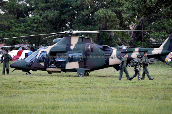 REINFORCEMENT: One of the two Agusta Westland AW109 multi-purpose army helicopters at Felda Sahabat brought to beef up the military assets used in the ‘Ops Daulat’ offensive against Sulu terrorists. — Bernama photo 
