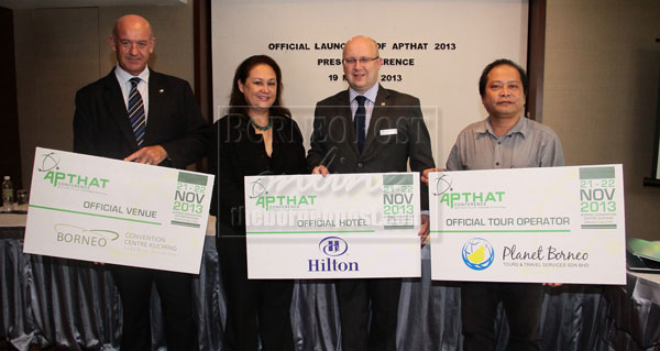PRIME MOVERS: Gracie (second left) in a photo session with (from left) the chief executive officer of Borneo Isthmus Development Sdn Bhd chief executive officer Paul D’Arcy, Hilton Kuching general manager Jon Warmington and Planet Borneo Tours & Travel Services Sdn Bhd executive director James Wan. 