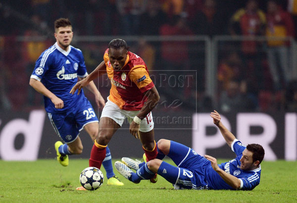 SPECIAL OCCASION: Galatasaray’s Drogba controls the ball during the UEFA Champions League match against FC Schalke 04 at the Ali Samiyen stadium in Istanbul in this Feb 20 file photo. — AFP photo