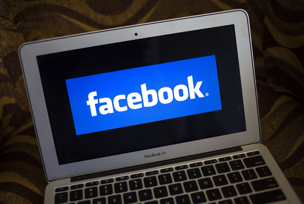 Facebook users continued to increase and shift over to mobile devices, underscoring the need for the company to grow its revenue there. — Reuters photo