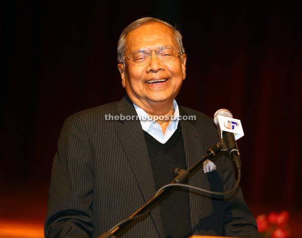 Adenan chuckling while delivering his speech at the state-level Grassroots Leadership Seminar. — Photo by Muhammad Rais Sanusi