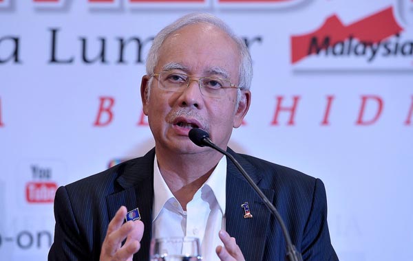 Najib during a press conference after chairing the Umno supreme council meeting at Menara Dato Onn. — Bernama photo