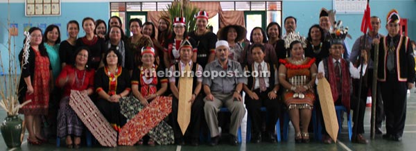 The Dayak community with Affandi (seated fifth left).