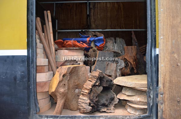 Chopping boards, decorative furniture and hoe handles ready to be transported to Miri.