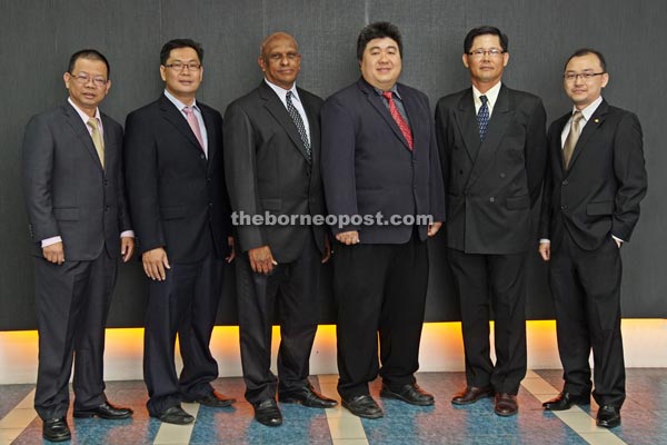 Hii (third right) poses with (from left) Teh, Tie, Nadison, Chia and Lee after the inaugural meeting.