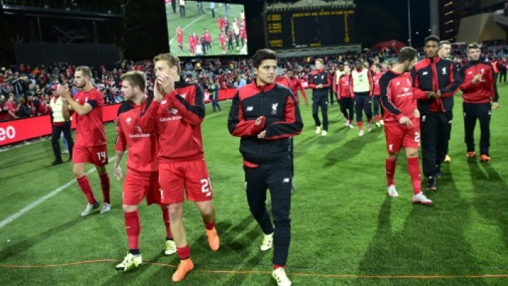 Liverpool players celebrate victory after their international friendly football match agaisnt Adelaide United in Adelaide on July 20, 2015 -AFP