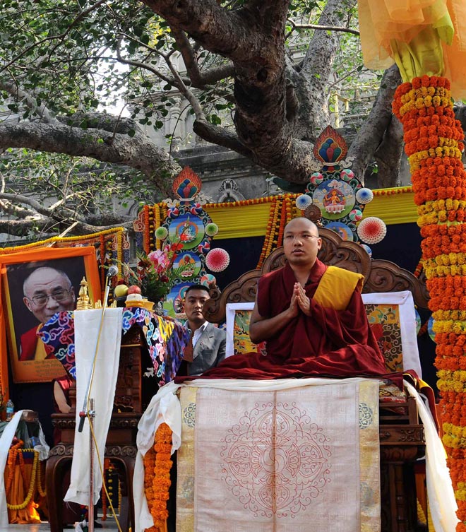 Tibetan spiritual leader, the 17th Karmapa, Ogyen Trinley Dorje offers prayers at The Mahabodhi Temple at Bodhgaya in this file picture. — AFP photo