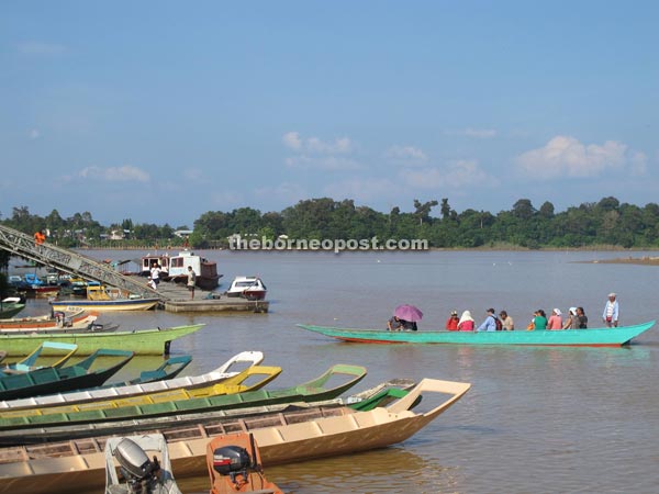 A longboat plying the river.