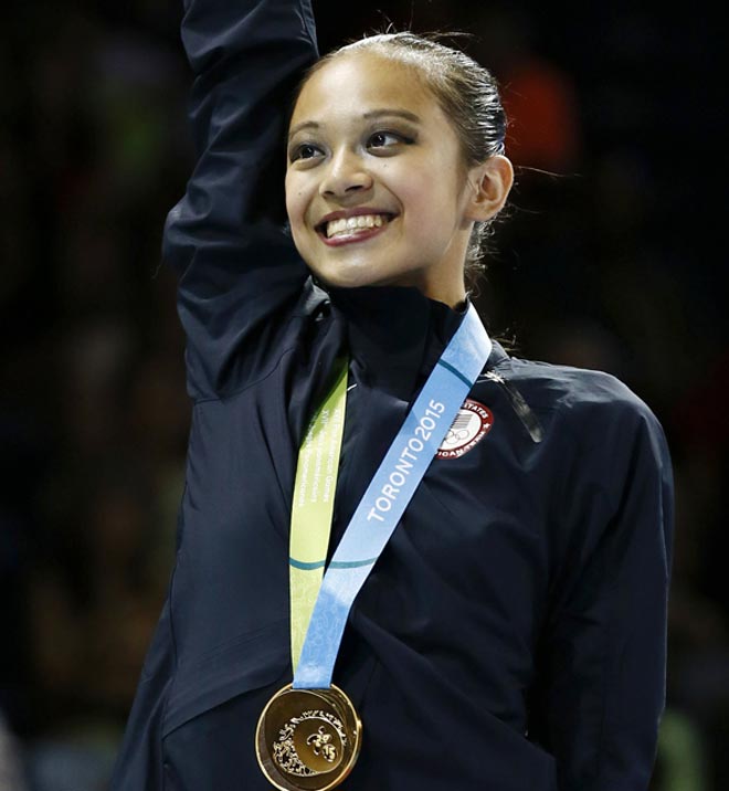 Laura Zeng celebrates after winning gold in the rhythmic gymnastics ribbons final during the Pan Am Games at Toronto Coliseum. — USA TODAY Sports