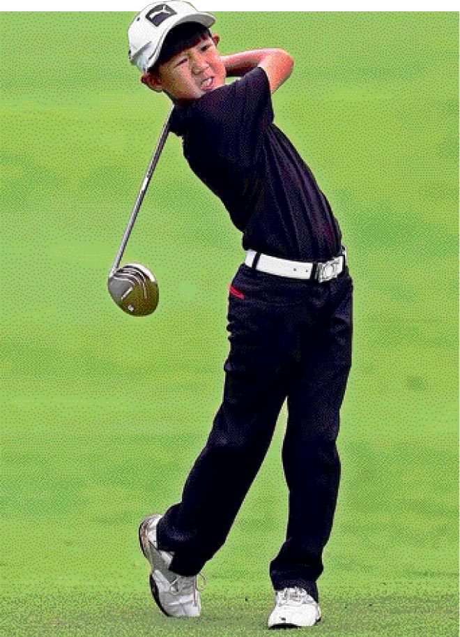 Anson Yeo in his element during the Malaysia’s leg of the 2014 Kids Golf World Championship held at Le Grendeur Golf Resort, Johor Bahru.