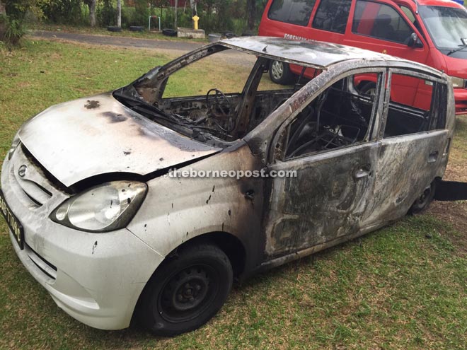 The Perodua Viva car that was destroyed in the fire at Kampung Bambangan, Papar yesterday. 