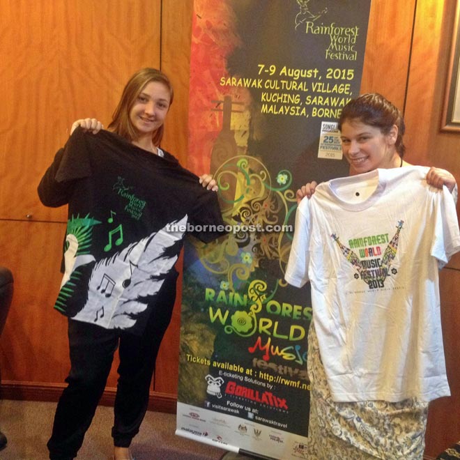 Happy buyers with their respective free festival T-shirts.