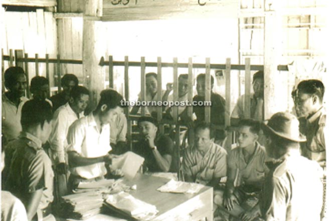 1963 counting of votes, Belaga 1963. Seated - Candidate Matu Puso (left) and Datuk Nyipa (right).