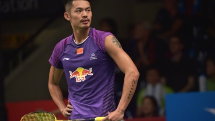 © AFP / by Nick Perry | China's Lin Dan in action against US rival Sattawat Pongnairat (not in picture) at the World Championships in Jakarta, on August 11, 2015 