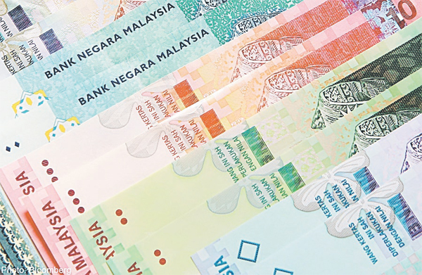 The ringgit along with other Asian currencies, including the Singapore dollar, the baht, peso and Korean won, weakened against the US dollar following a surprise change in China’s foreign exchange policy to devaluate its tightly-controlled currency, the renminbi.