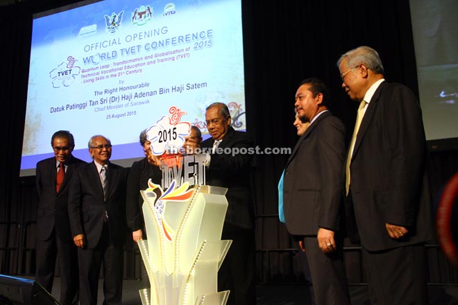 Adenan (centre) launching World TVET Conference 2015 while (from left) Len Talif, Jabu, Treadell (partly hidden), Thompson (partly hidden) Abdul Aziz and Manyin look on.