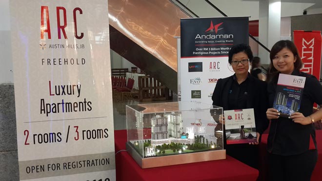 (From left) Andaman Group’s sales and marketing manager Patty Lim and sales executive Nicole Kew holding the leaflet of the projects at Boulevard Shopping Mall yesterday.