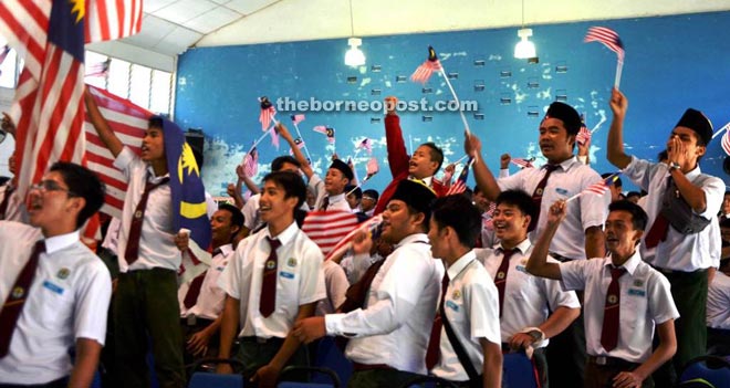 Students of SMK Telang Usan in high spirits as they shout ‘Merdeka, Merdeka’, as they wave the flags.