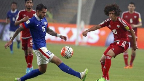 UAE's Amer Abdulrahman (R) and Malaysia's Putera Nadher Amarhan during their AFC qualifying match for the 2018 FIFA World Cup at the Mohammed Bin Zayed Stadium in Abu Dhabi on September 3, 2015. 