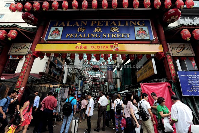 Businesses operating as usual at Petaling Street yesterday despite rumours of another rally to be held today. — Bernama photo