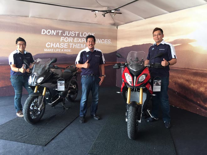  Image shows (from right) Gavin Tay (Head of Sales of Regas Premium), Simon Wang (Principal Dealer of Regas Premium) and Ben Foo (Motorrad Sales Supervisor of Regas Premium) posing next to the two new BMWs.