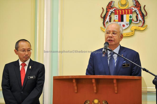 Najib speaking on the proactive economic measures to be taken by the government at the Prime Minister’s Department, Perdana Putra Building yesterday. On his right is Minister in the Prime Minister’s Department, Datuk Seri Abdul Wahid Omar who chaired the Special Economic Committee to formulate the action. — Bernama photo