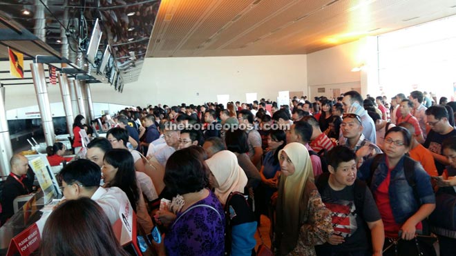 It was a hectic situation at the AirAsia counters at KIA yesterday as many anxious passengers try to secure seats on the next available flights to their destinations.