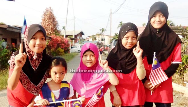 Children join in National Day celebration in Keningau and Sook.