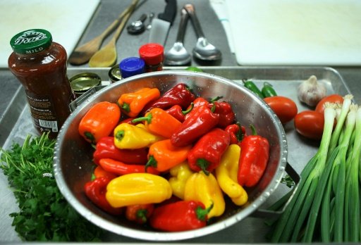  © Getty/AFP/File / by Marie Julien | Cookbooks are flourishing as people across the globe flock to their kitchens 