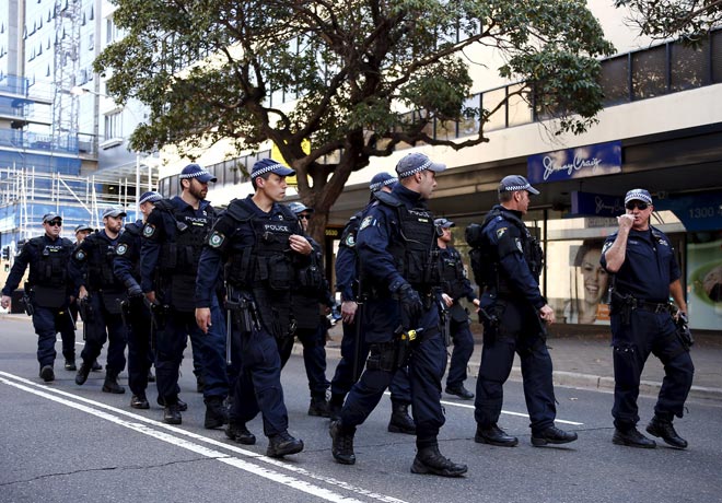 Police block off a street ahead of the arrival of demonstrators demanding the closure of the Parramatta Mosque in western Sydney, Australia. — Reuters photo