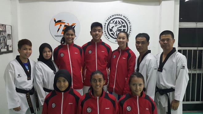 Some exponents posing with state technical chairman Tan Check Joon (right) and coaches after a training session in Kuching recently.