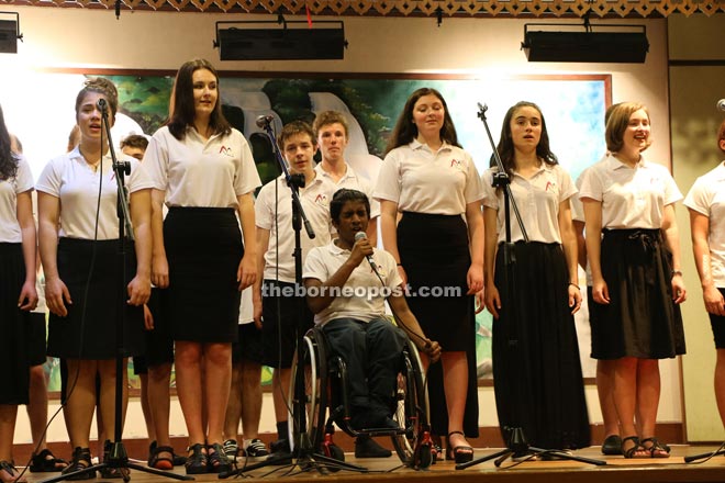 Shakti performs with the Scat Choir from Hillcrest High School. 