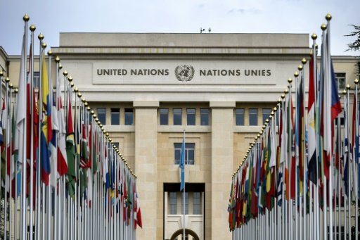 A photo taken on September 15, 2015 shows flags lining the front lawn of the "Palais des Nations", which houses the United Nations Office in Geneva.- AFP Photo