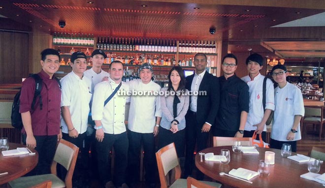 Students pose for a group photo with Leong (fifth left), Nobu KL general manager Ai Sunaga (fifth right), Wan (third right) and Pudun (fourth left) after the student review session. 