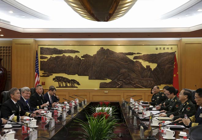 US Navy Admiral Harry Harris, Commander US Pacific Command (left) and China’s PLA Chief of Staff General Fang Fenghui (second right) attend a bilateral meeting at the Bayi Building in Beijing, China. — Reuters photo