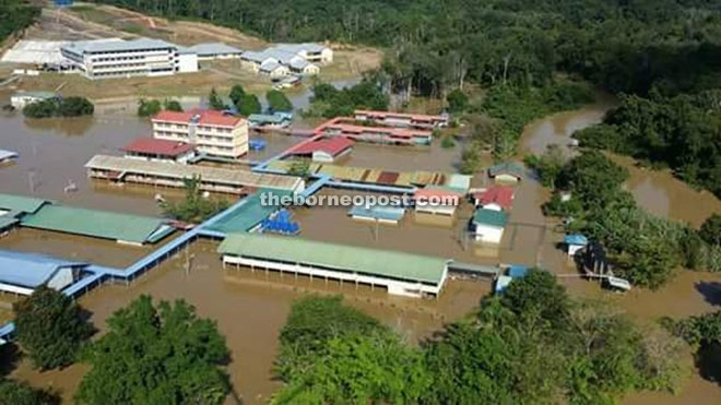 A longhouse and school in Long Panai were submerged as of 3.30pm yesterday. — Photo courtesy of Jau Laing
