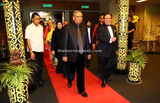 Adenan, accompanied by Abang Johari, arriving at BCCK for the function.