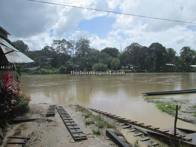 The rising flood water following incessant heavy rain. 