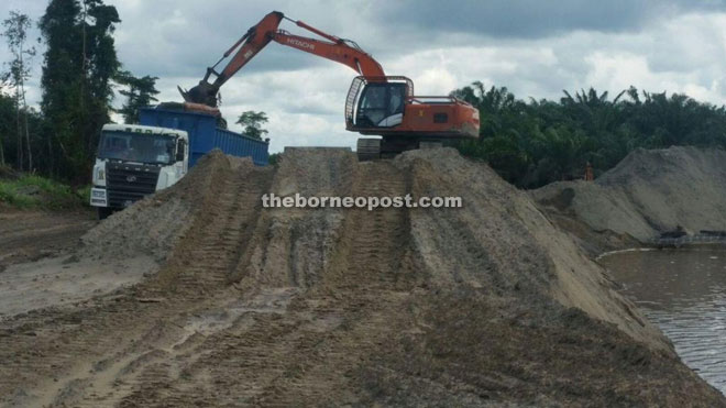 The illegal soil dredging and transferring activity at Permyjaya area.