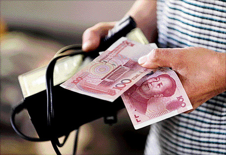 Zeti says the IMF’s move will help pave the way for broader use of the renminbi in trade and finance. — Reuters photo 