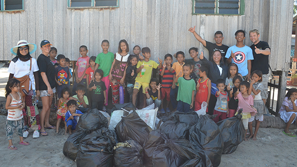 Volunteers and local residents with the sizeable haul of rubbish collected during the beach cleanup.